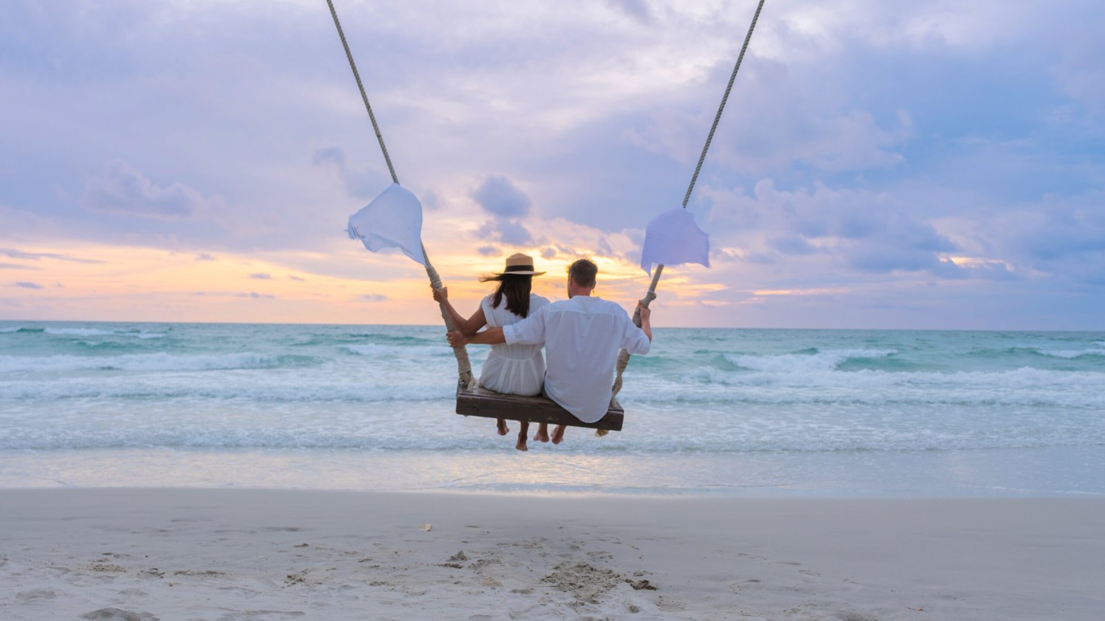 Retired couple enjoying peace of mind on the beach